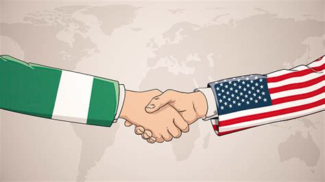 Cooperation Between Nigeria And Usa In Front Of World Map The Concept ...