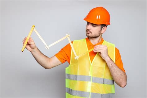 Premium Photo | Young man civil engineer in safety hat