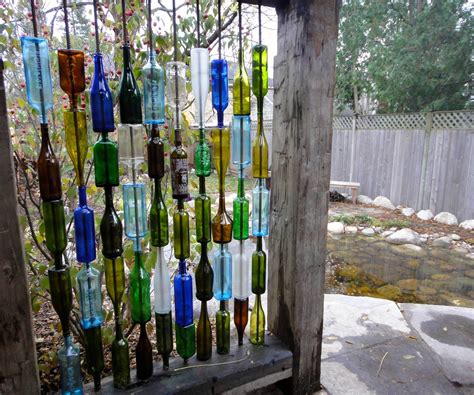 How to Build a Wall From Recycled Bottles | Wine bottle wall, Patio wall art, Bottle wall
