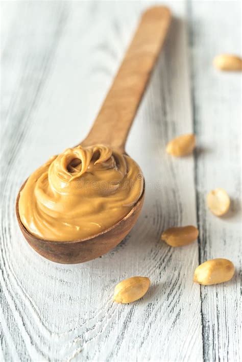 Wooden Spoon of Peanut Butter Stock Image - Image of diet, background: 127245007