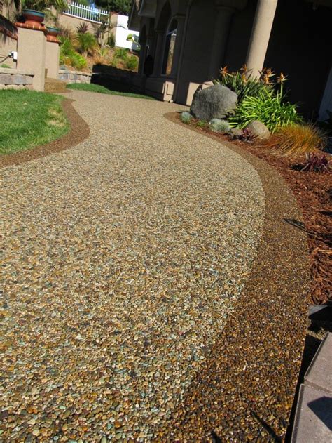 pebble coating walkway | Patio stones, Outdoor walkway, Front garden ideas driveway