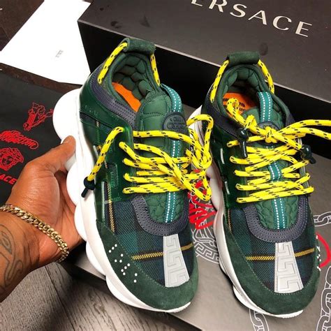 The Versace Green & Yellow "Chain" Sneakers is now available to pick up ...