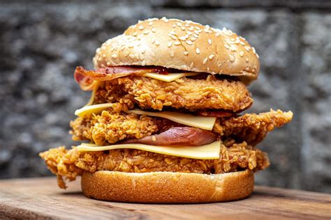 KFC launches 'The Triple Stacker' burger on its secret menu | 7NEWS.com.au