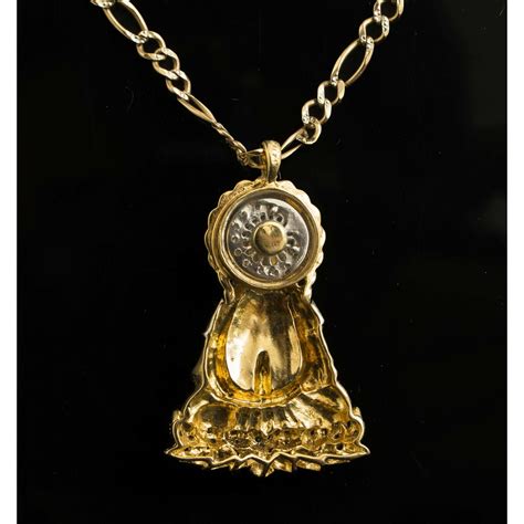 18k Gold/Diamond Buddha Pendant | Witherell's Auction House