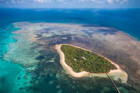 Helicopter ride of the Barrier Reef in Cairns, Australia. Photo looking ...