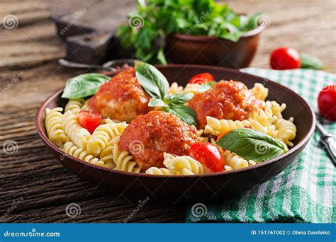 Fusilli Pasta with Meatballs in Tomato Sauce and Basil in Bowl. Stock Photo - Image of italian ...