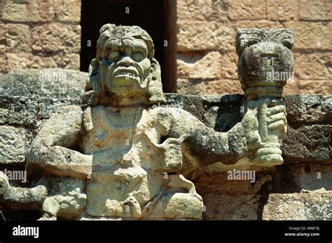 The Mayan rain god Chac, in west court of the Mayan ruins at Copan ...