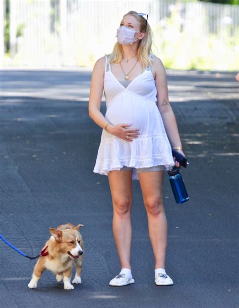 Pregnant Sophie Turner Cradles Her Baby Bump on Walk With Joe Jonas