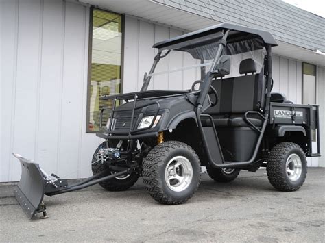 Ready to plow snow TODAY! This lightly-used 2014 Landmaster LM500S 4x4 ...