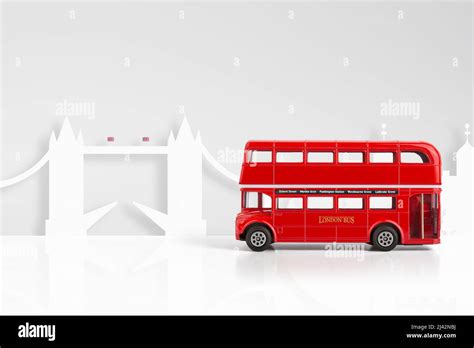 Red Model Bus & London skyline concept Stock Photo - Alamy