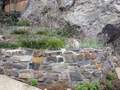 10 Stone Garden Wall Ideas, Most of the Amazing and Stunning | Stone retaining wall, Hillside ...