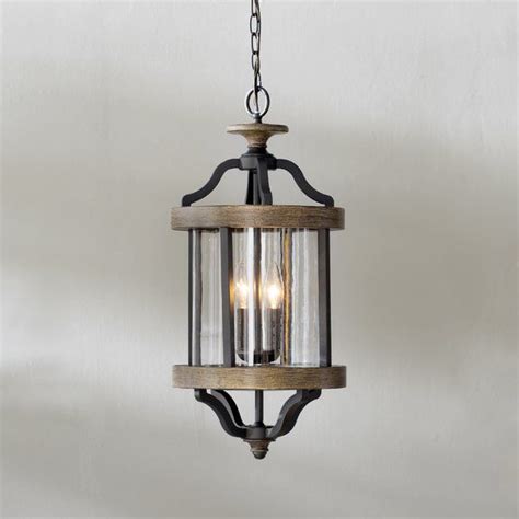 Glowing with style, this stunning two-light outdoor pendant is the perfect finishing tou ...