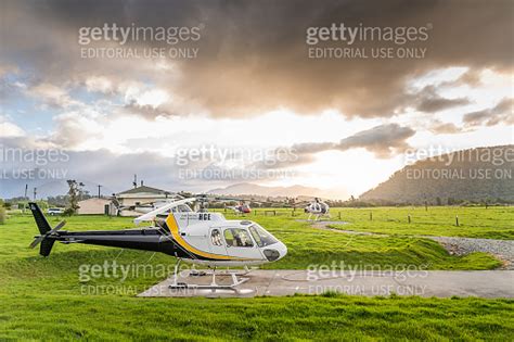 Helicopter service for landing on snow mountain in Fox Glacier town Southern Alps Mountain ...