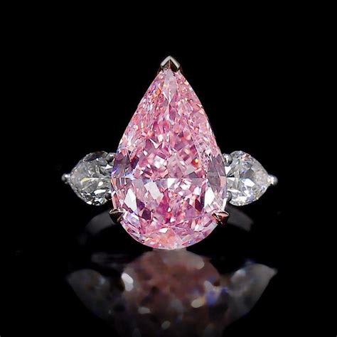 Graff on Instagram: “Symphony in pink. . 6.79 carat Fancy Vivid Pink pear shape diamond rin ...