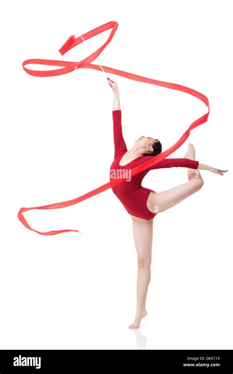 Female gymnast performing rhythmic gymnastics with ribbon Stock Photo ...