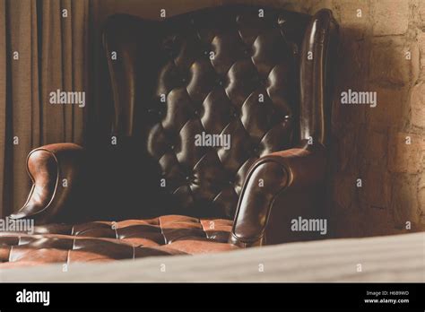 vintage of leather Armchair Stock Photo - Alamy