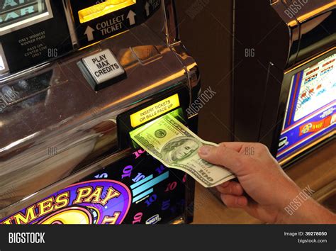 Hand Putting Money Into Slot Image & Photo | Bigstock