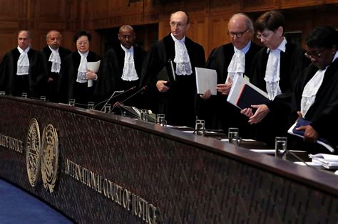 Judges are seen at the International Court of Justice in The Hague ...