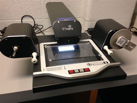 Loading microfilm or fiche - Microform Viewer/Scanner - LibGuides at Bethel College Library