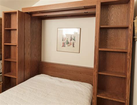 Queen Size Murphy Bed in Oak Bookcase Cabinet | EBTH