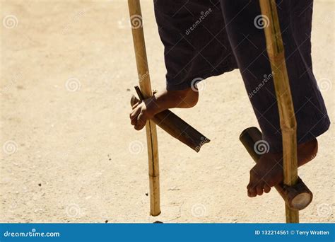 Thai Boy Walking on Homemade Bamboo Stilts Stock Image - Image of local ...