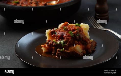 Beef and vegetable stew with mashed potato hi-res stock photography and ...