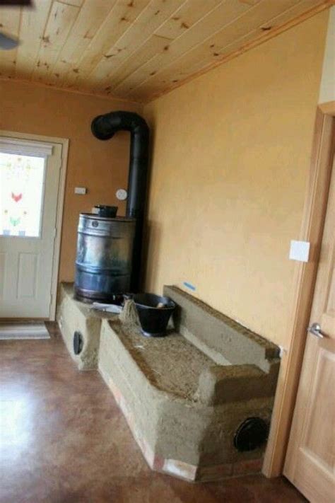 Rocket stove with heated bench. | Earthship/Cob house dream home ...