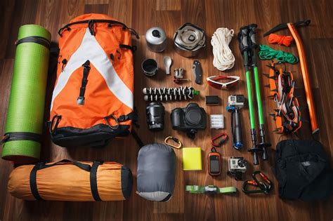 Premium Photo | Equipment necessary for mountaineering and hiking on ...