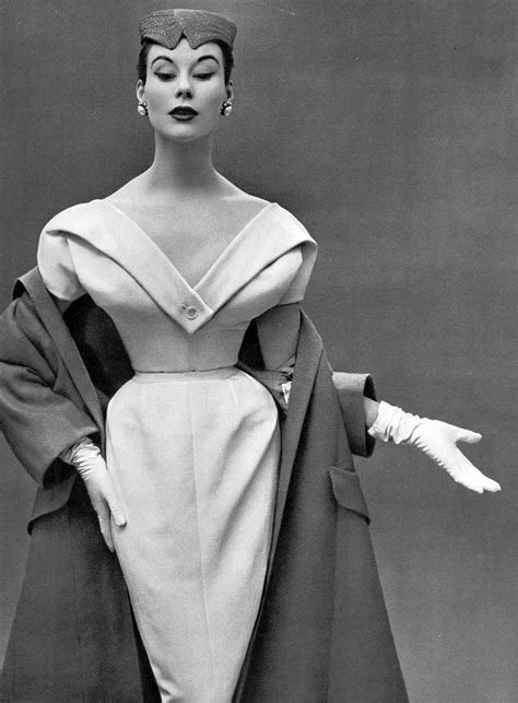 Myrtle Crawford in this new silhouette by Christian Dior, the significantly widened shoulders ...