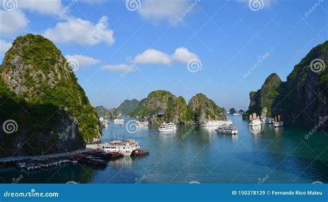 Karst Landforms in the Sea Y Tourist Junks in Halong Bay in Vietnam ...