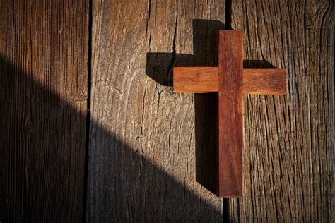 Premium Photo | Christian cross on wood over wooden