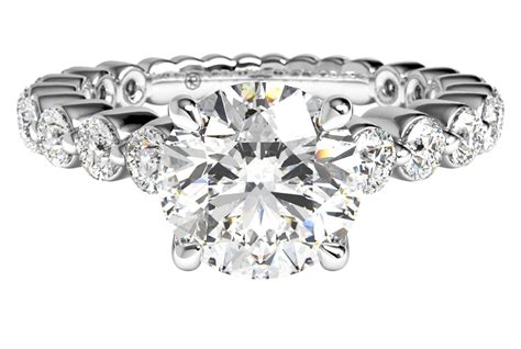 The highlight of this ring is the stunning diamond band. Diamonds are set with shared prongs ...