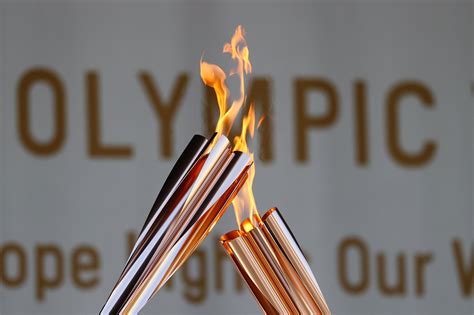 Olympic Torch Image Clipart Of A Log