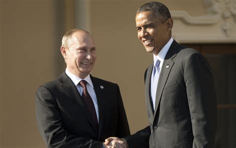 Obama, Putin smile for the cameras