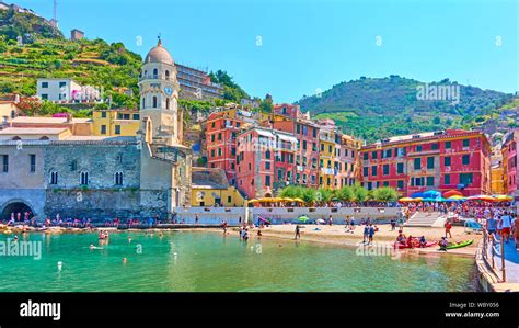 Vernazza, La Spezia, Italy - July 2, 2019: Panoramic view of the beach and waterfront in ...