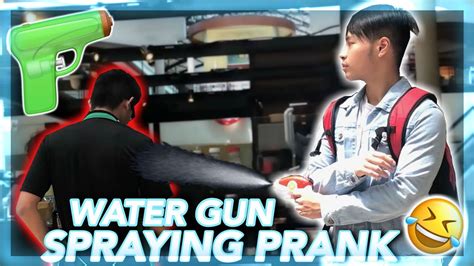 WATER GUN SPRAYING PRANK!!! - YouTube