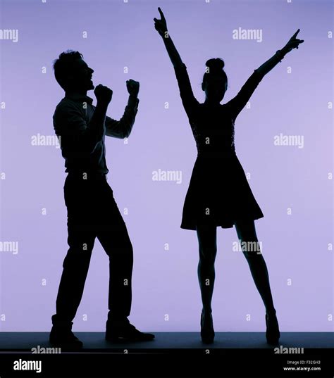 Joyful young people dancing together Stock Photo - Alamy