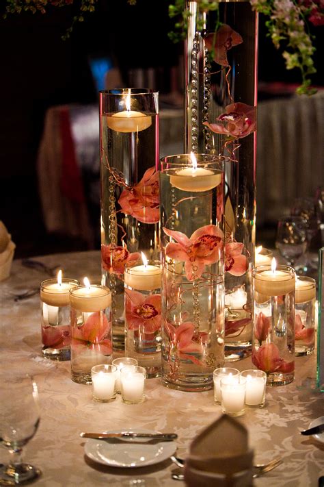 Love lots of candles-great ambience! | Candle wedding centerpieces, Candle wedding decor ...
