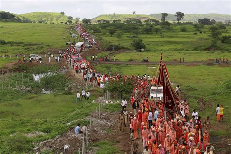 Kumbh Mela: Thousands bathe in Godavari river at start of ancient Hindu ...