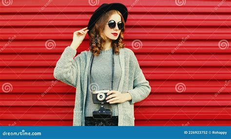 Portrait Young Woman Photographer with Vintage Film Camera on a Red Background Stock Photo ...