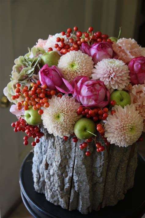 I love this amazing flower arrangement with roses, mums, pepper berries, and green apple ...