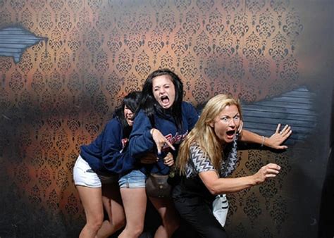 10 Hilarious Photographs Of People Being Scared In Haunted Houses