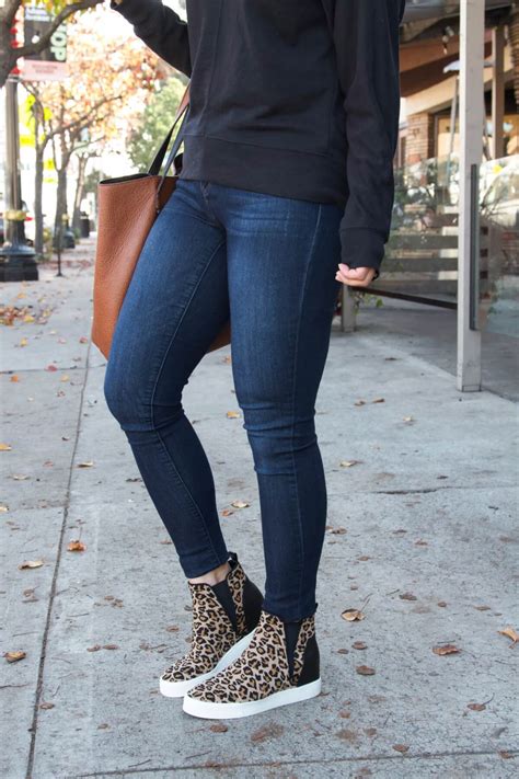 Black Sweatshirt, Skinny Jeans, Leopard Wedge Sneakers, Cognac Tote ...