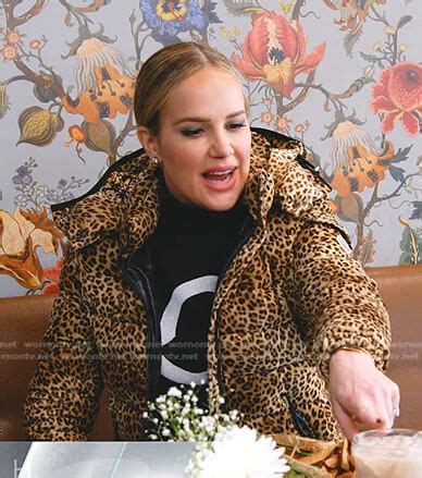 WornOnTV: Angie’s black logo sweatshirt and leopard puffer jacket on ...