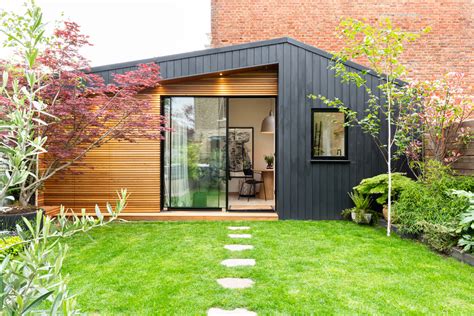 A Tiny Guest House with “The World’s Smallest Sink” and Fluted Cabinets