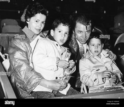 Audie Murphy (second from right) attending the circus with his wife Pamela Archer (left) and ...