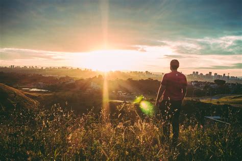 Man Standing on Green Grass · Free Stock Photo