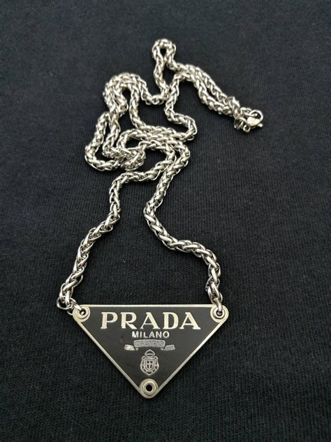 Prada 💥RARE💥Prada Triangle Necklace Chain Pendant Silver Colour | Grailed | Triangle necklace ...