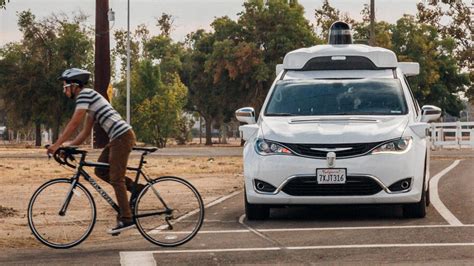 Waymo explains what its self-driving cars should do when pulled over - CNET