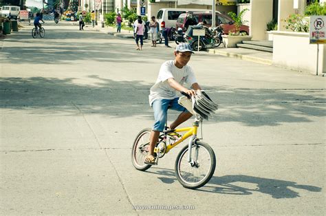 stock images paper boy for newspaper delivery in philippines stock photos